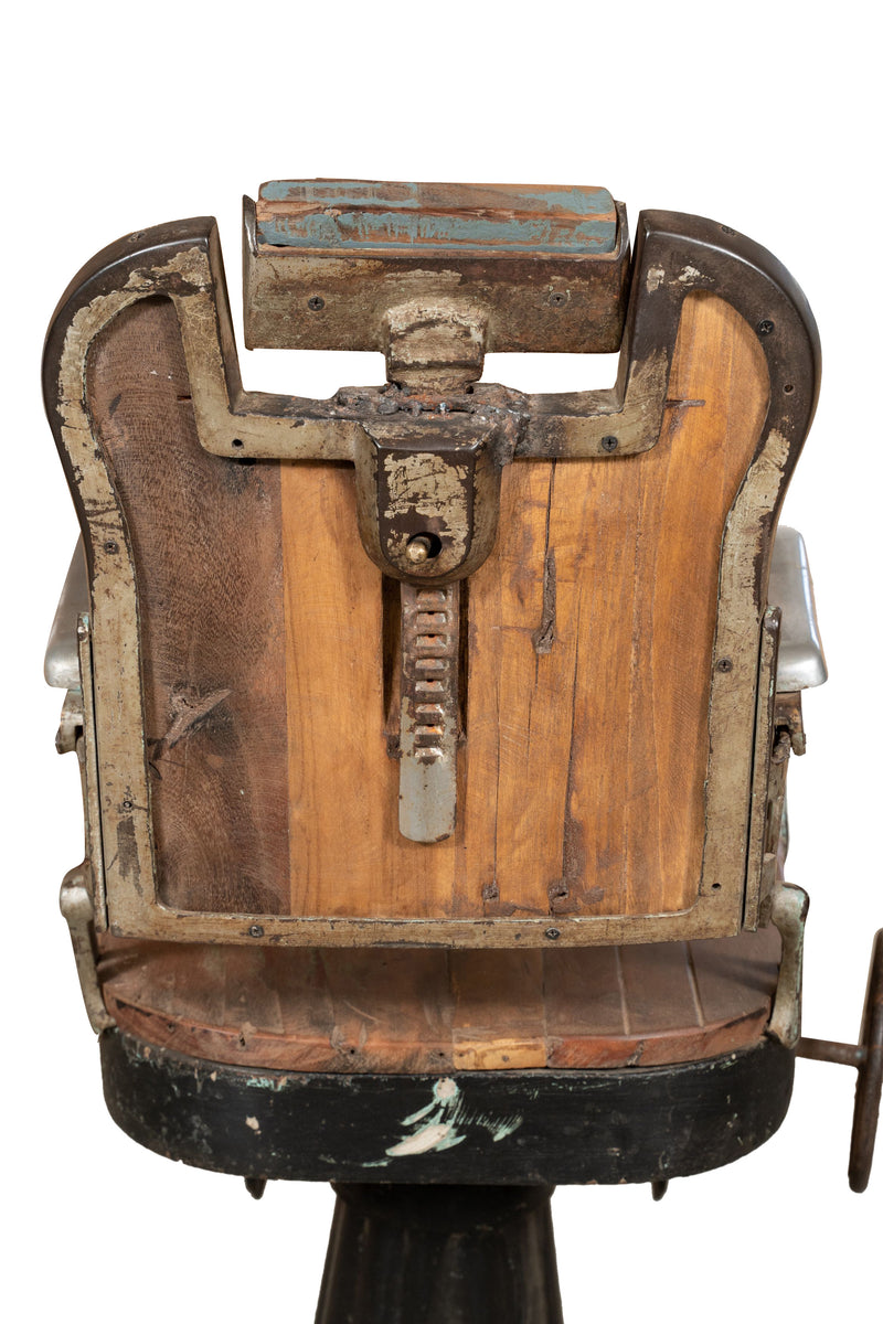 Biscottini Vecchia sedia poltrona da barbieri restaurata