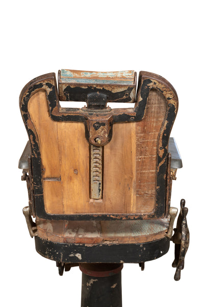 Biscottini Vecchia sedia poltrona da barbieri restaurata