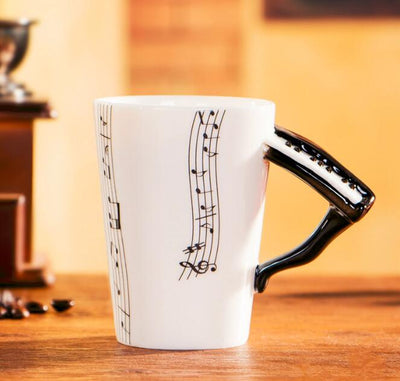 Coffee Cup with Music Notes in the Form of Saxophone Handle Ceramic Porcelain Cup of Tea Milk Method