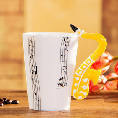 Coffee Cup with Music Notes in the Form of Saxophone Handle Ceramic Porcelain Cup of Tea Milk Method