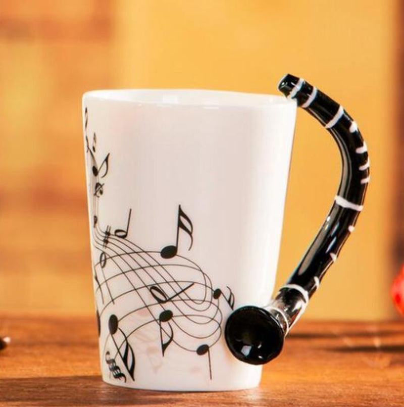 Coffee Cup with Music Notes in the Form of Saxophone Handle Ceramic Porcelain Cup of Tea Milk Method