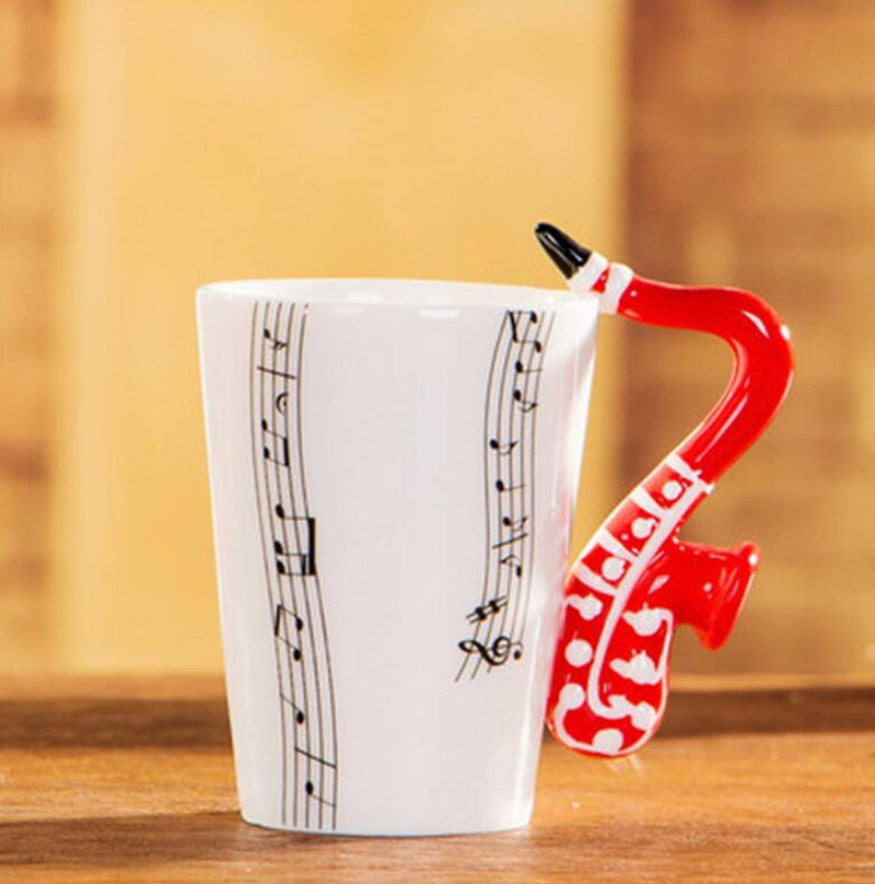 Coffee Cup with Music Notes in the Form of Saxophone Handle Ceramic Porcelain Cup of Tea Milk Method